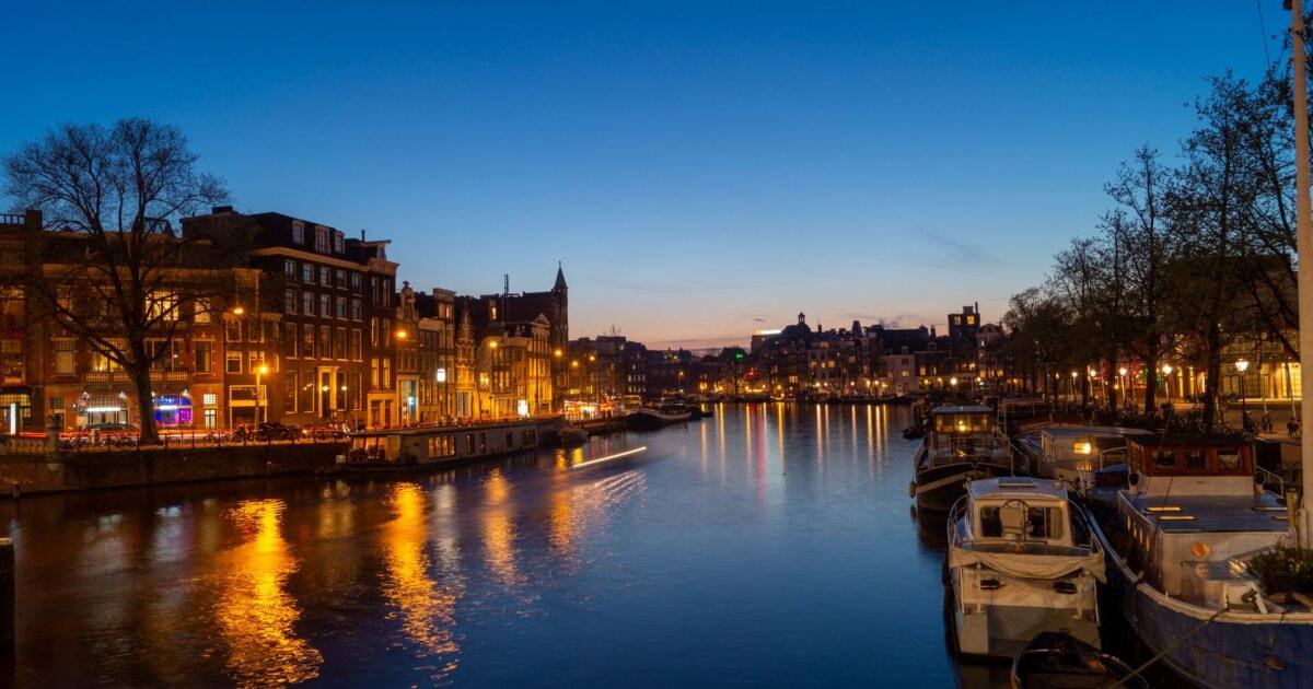 amsterdam canal aerial evening golden hour dusk