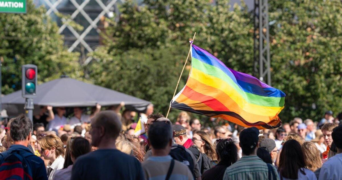 Crowd at Berlin Pride 2026 CSD parade with rainbow flags