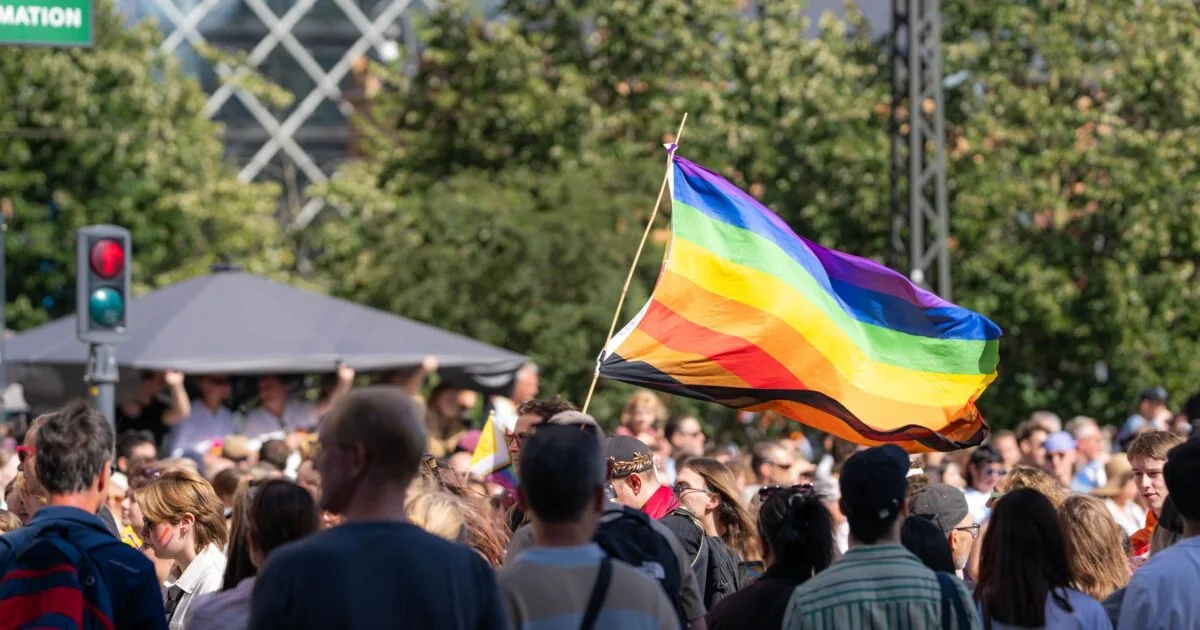 Crowd at Berlin Pride 2026 CSD parade with rainbow flags