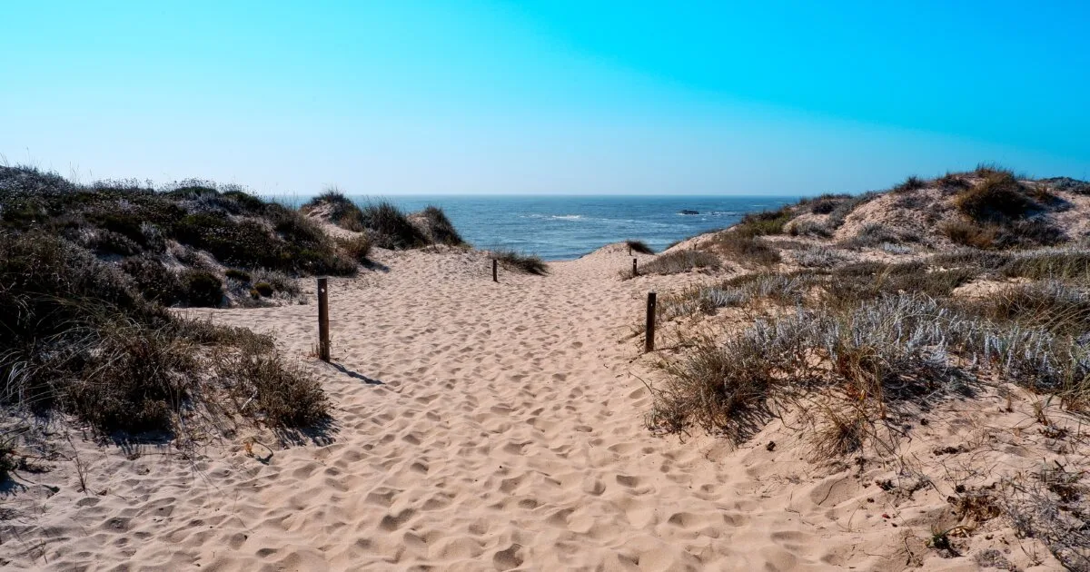 Pathway through sand dunes to the Atlantic Ocean in Portugal, Beach 19 Costa da Caparica Lisbon