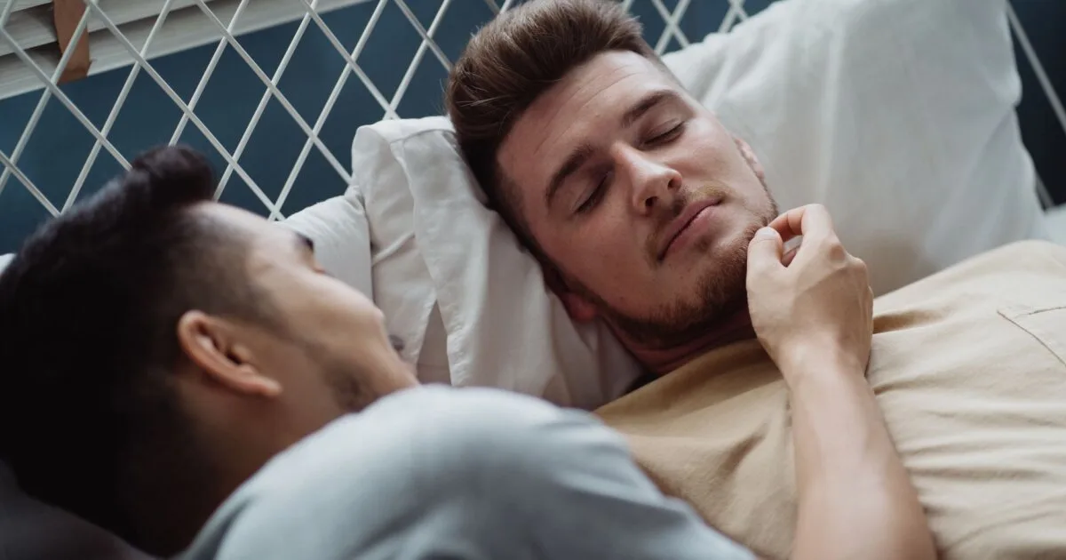 A loving couple sharing a tender moment in the bedroom