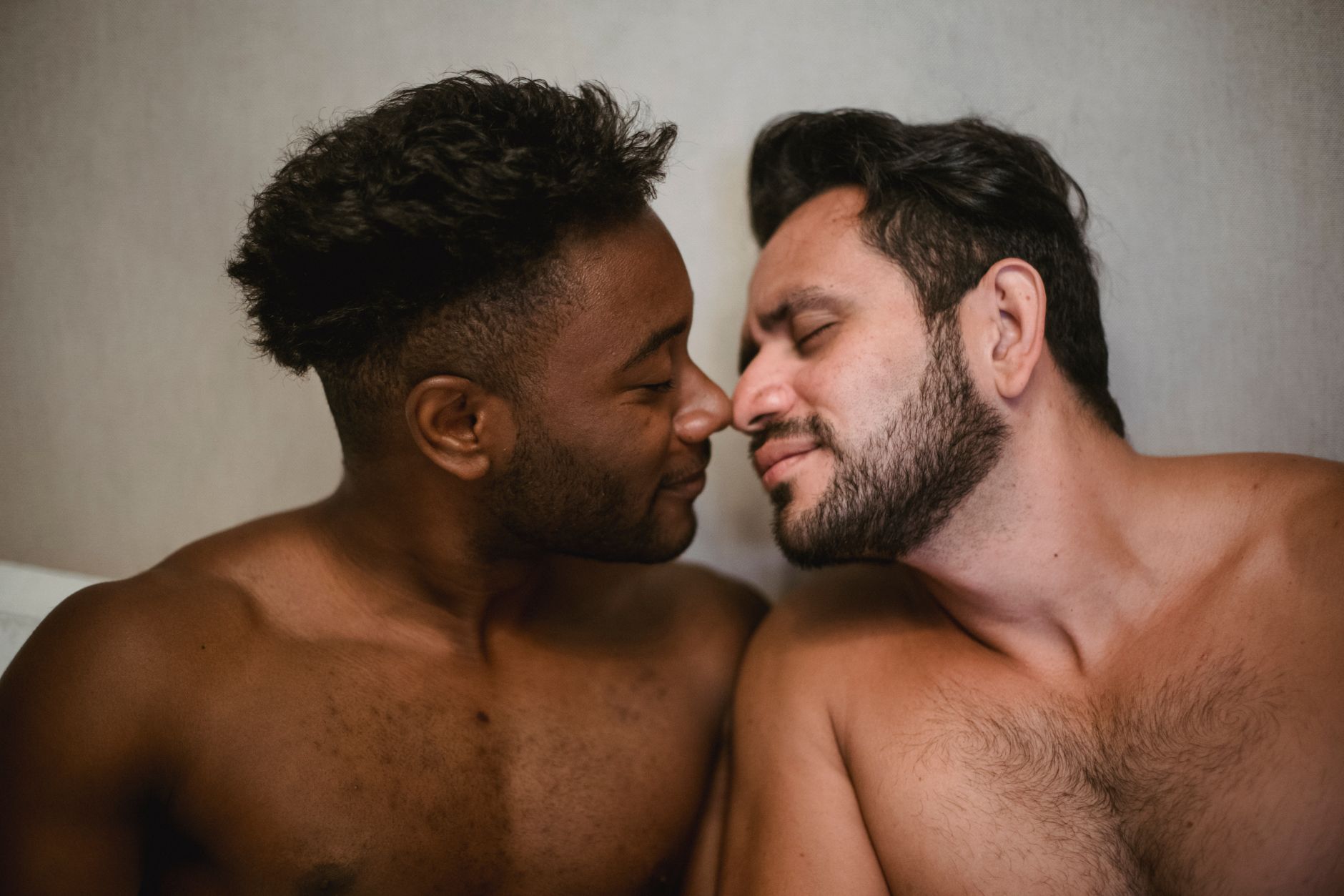 Two men sharing a close, affectionate moment