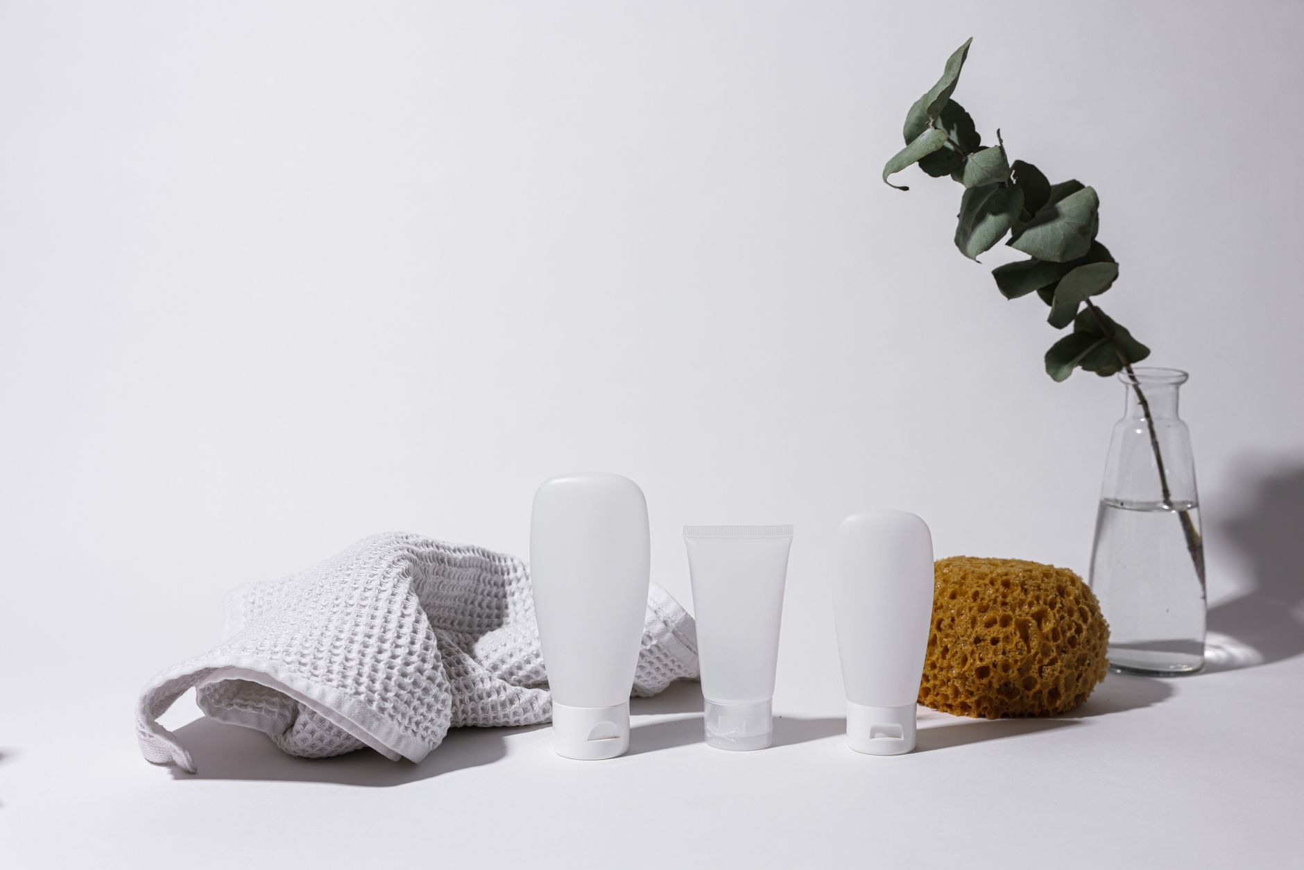 Clean, minimal arrangement of wellness and lube products