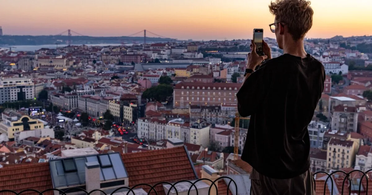 View over Lisbon's rooftops at sunset, the city of the gay neighbourhoods from Príncipe Real to Arroios