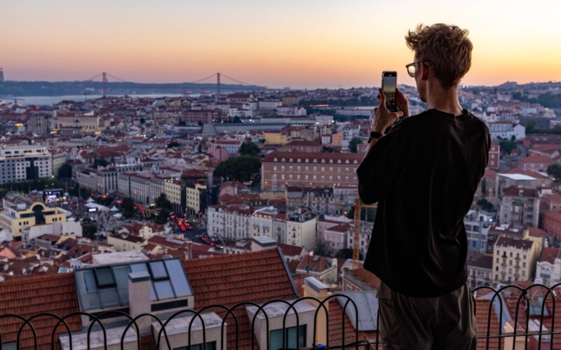 View over Lisbon's rooftops at sunset, the city of the gay neighbourhoods from Príncipe Real to Arroios