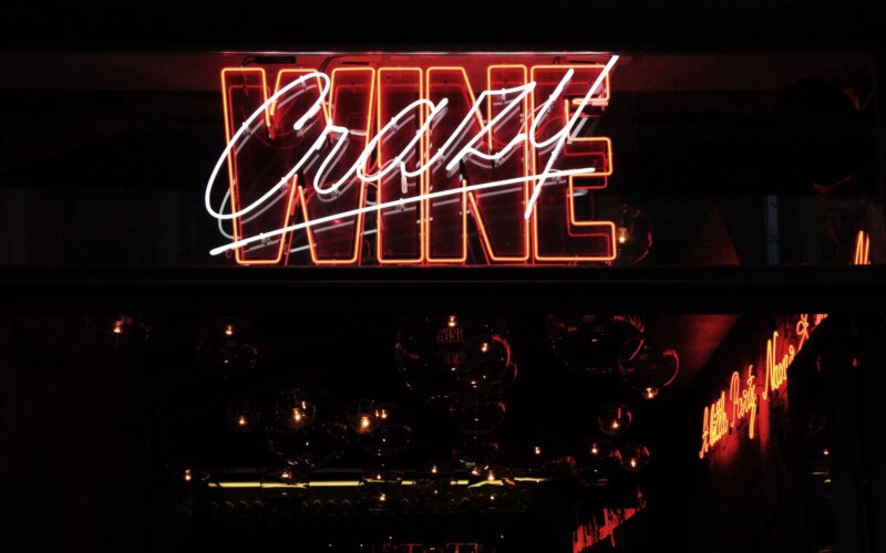 Dark neon bar interior, Berlin gay sex club atmosphere