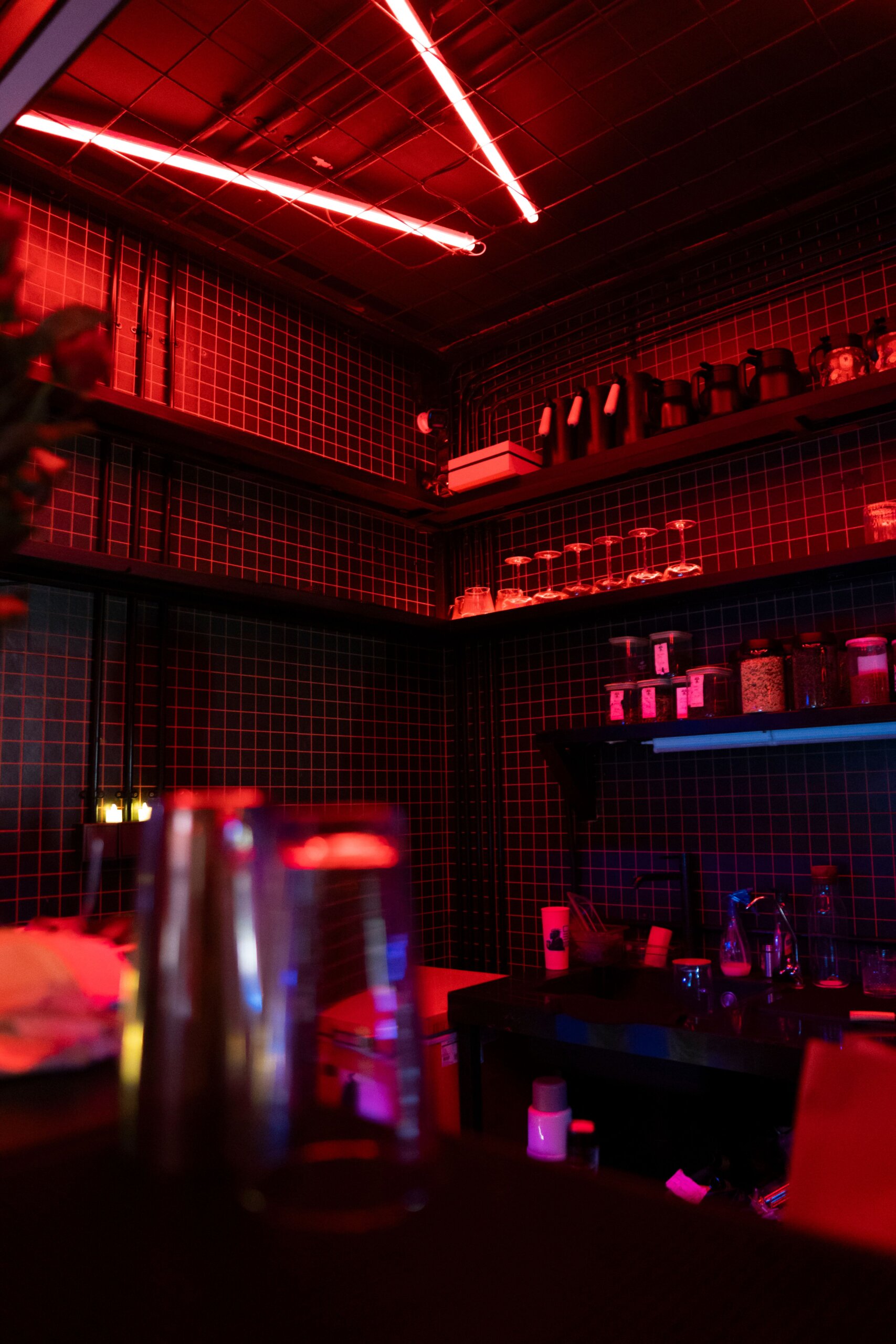 Neon-lit bar shelves, Berlin gay nightlife interior