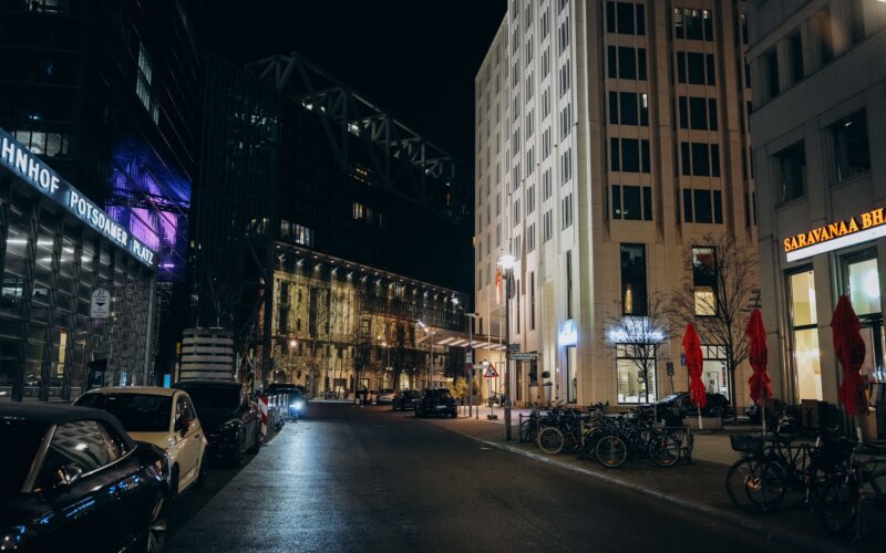 Night view of Potsdamer Platz Berlin, city lights reflecting